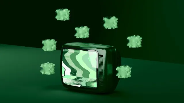 Téléviseur rétro à l’écran ondulé vert, entouré de cubes verts